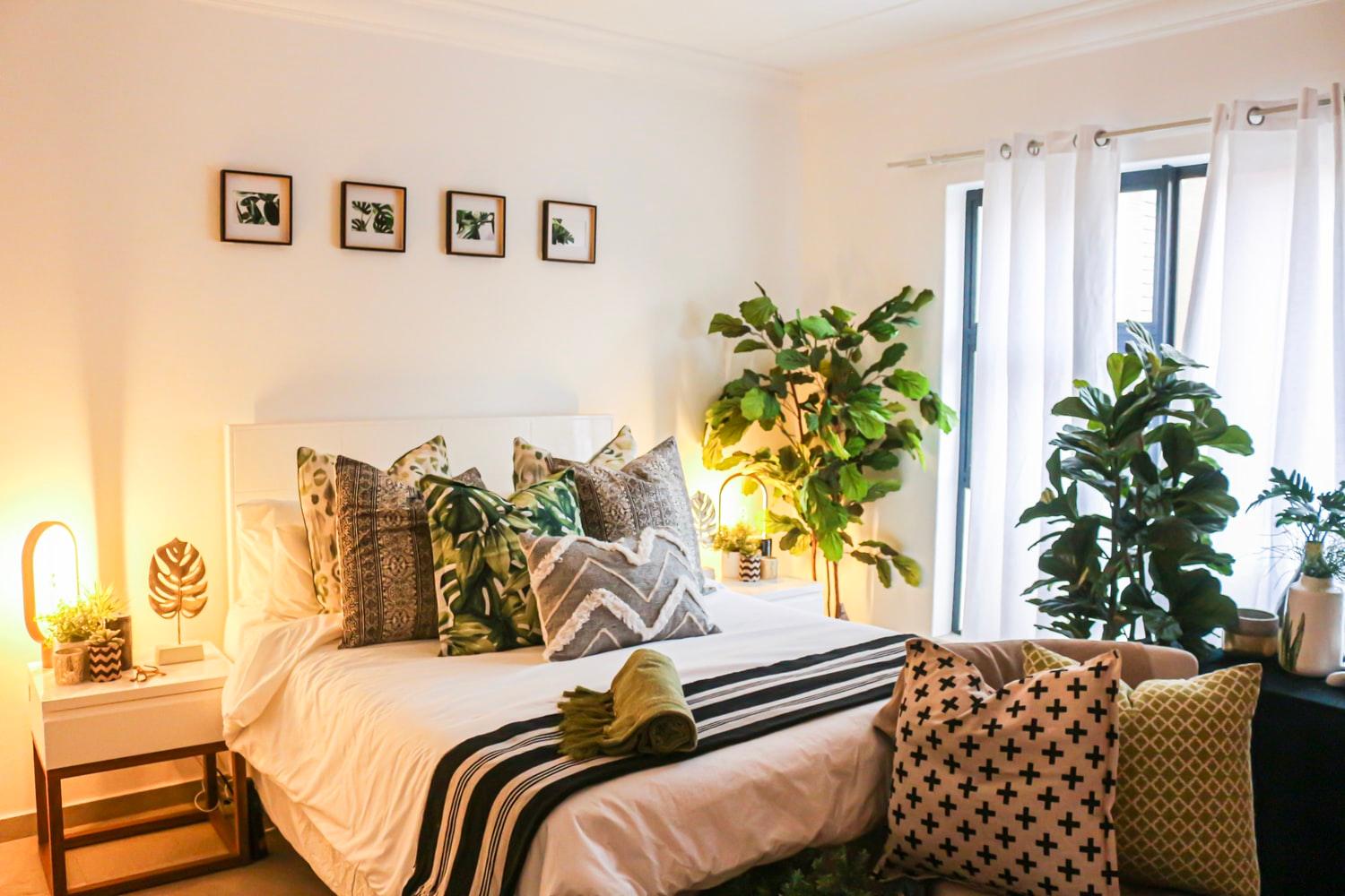 Throw pillows + a good amount of greens ar