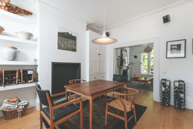 Modern dining room design with wooden table and chairs