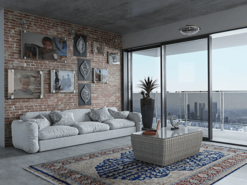 A well furnished living room with glass windows overlooking the city