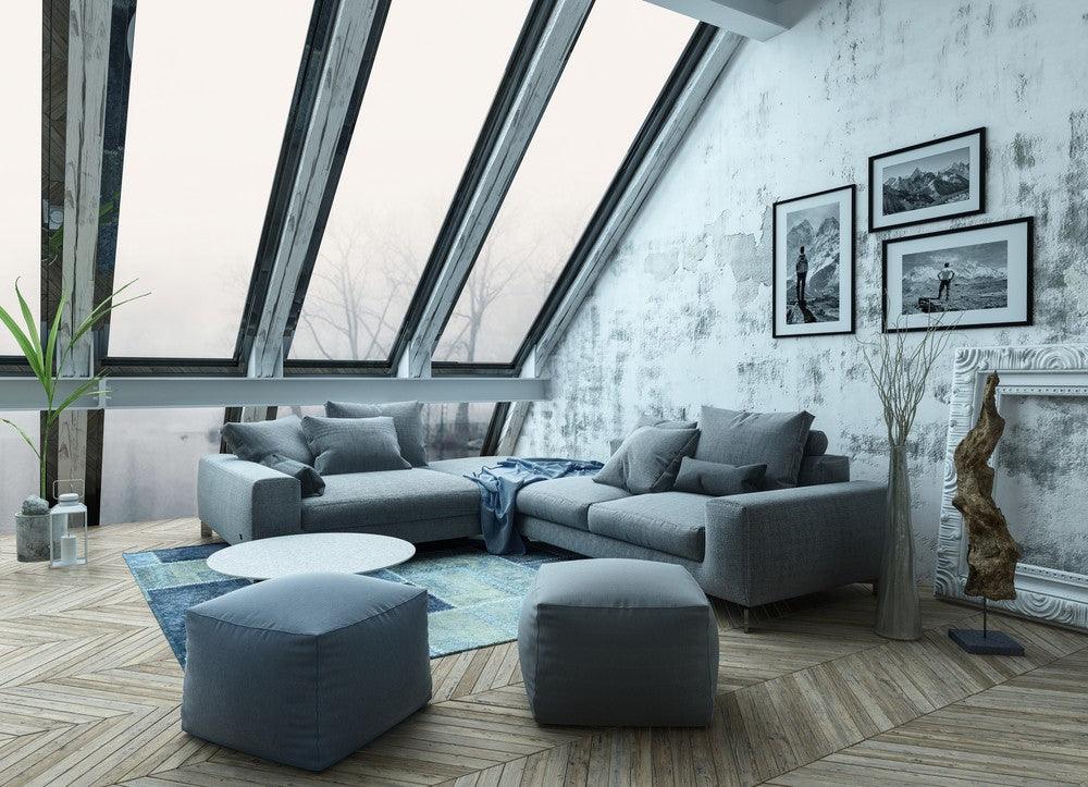 Rooftop apartment with sofa chairs and herringbone style hardwood floor