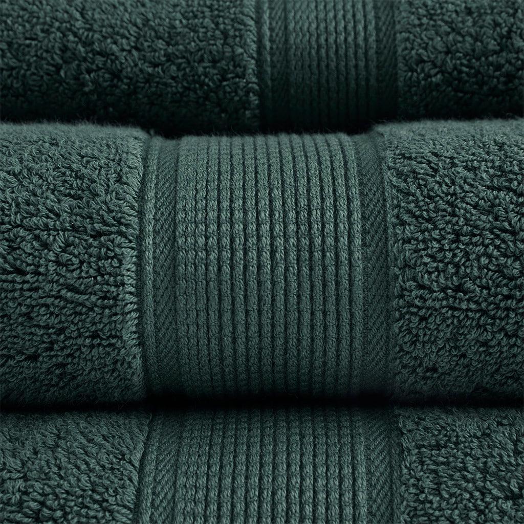 https://www.casaone.com/cdn/shop/files/800gsm-bath-towel-dark-green-olliix-com-casaone-3.jpg?v=1686665271