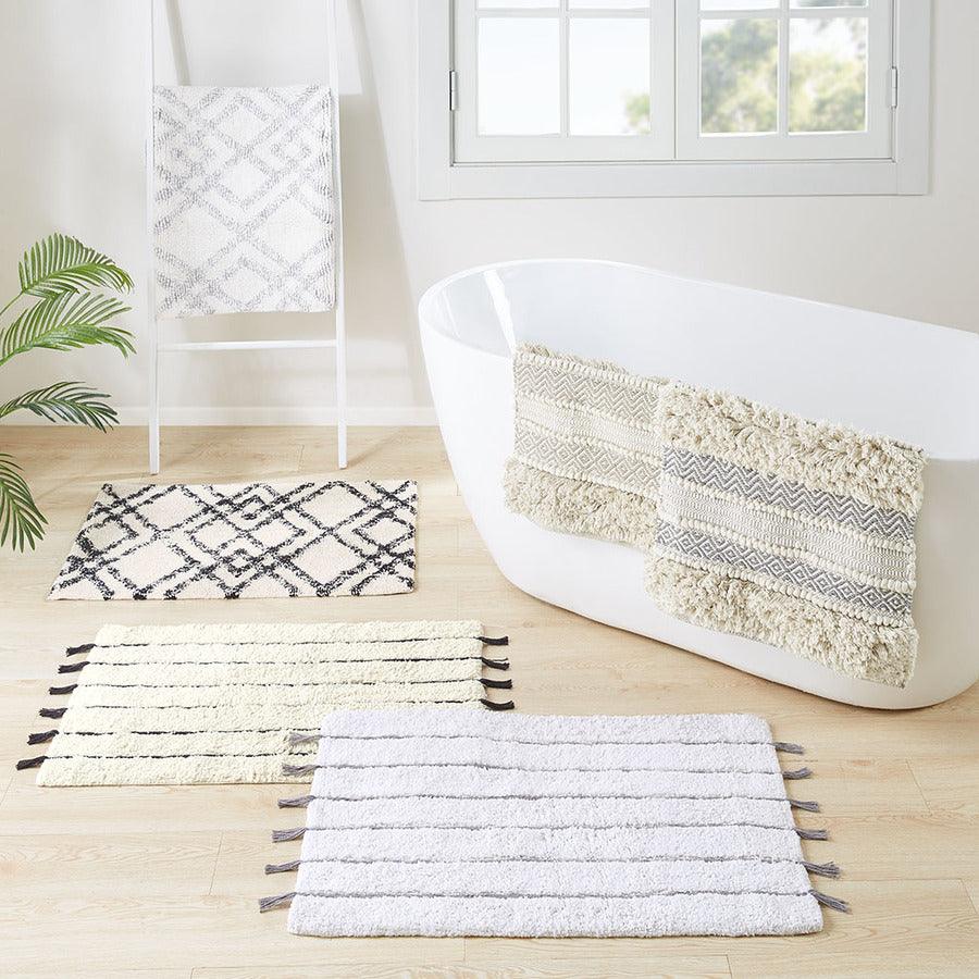 Olliix.com Bath Rugs - Arbor Stripe Tassel Cotton Tufted Rug Black & Neutral
