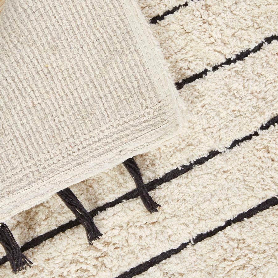Olliix.com Bath Rugs - Arbor Stripe Tassel Cotton Tufted Rug Black & Neutral