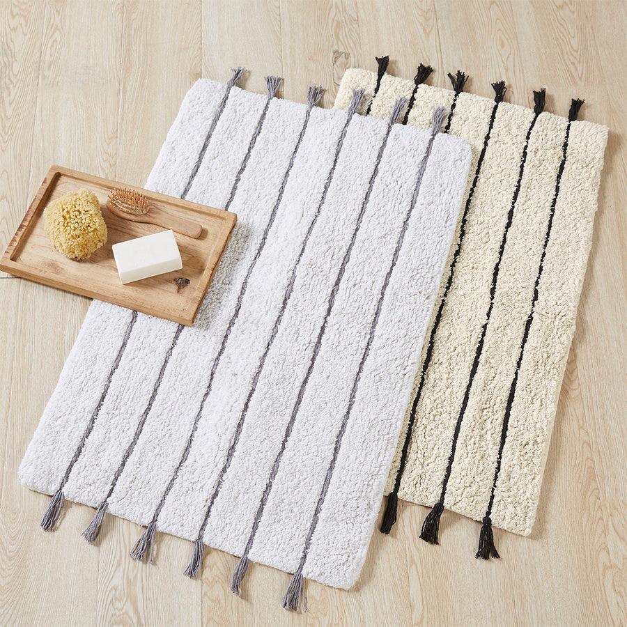 Olliix.com Bath Rugs - Arbor Stripe Tassel Cotton Tufted Rug Black & Neutral