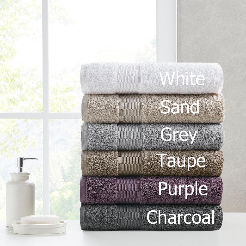 https://www.casaone.com/cdn/shop/files/luxor-bath-towel-taupe-olliix-com-casaone-7.jpg?v=1683980765