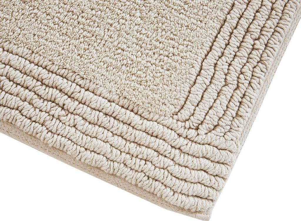 https://www.casaone.com/cdn/shop/files/splendor-21-bath-rug-taupe-olliix-com-casaone-4.jpg?v=1686664173